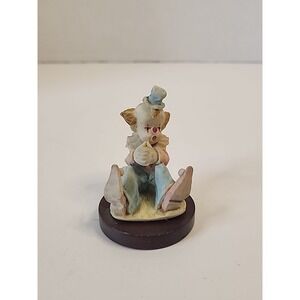 Albert E. Price Small Sitting Clown Figurine On Wooden Base  2.75" X 2.25"